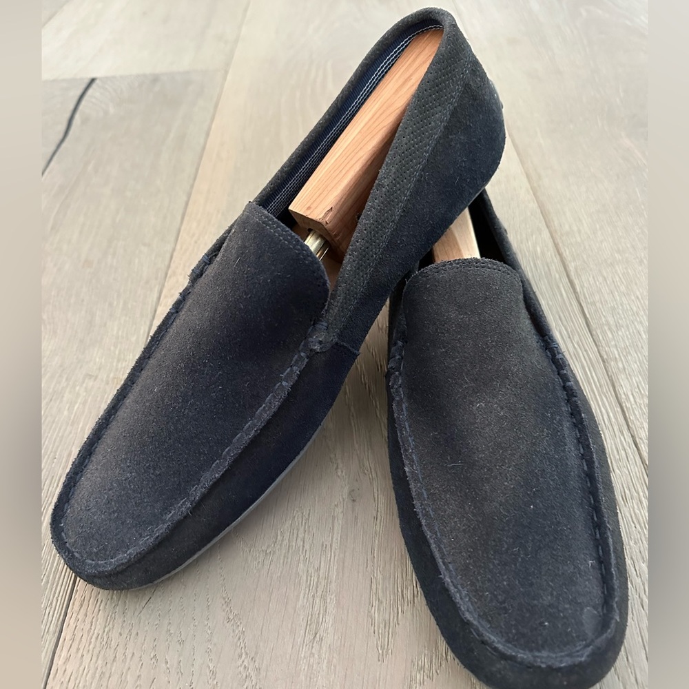 Sleek navy blue Lacoste driving loafer, size 10.